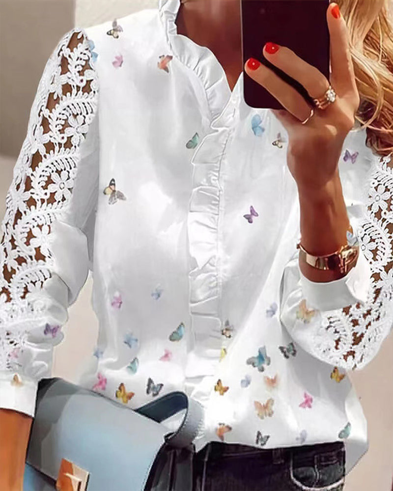 Blusa de encaje con paneles estampados