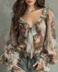 Blusa elegante con estampado de loto