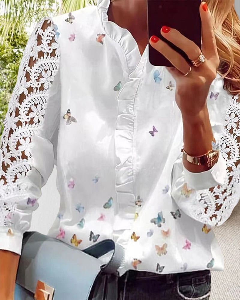 Blusa de encaje con paneles estampados