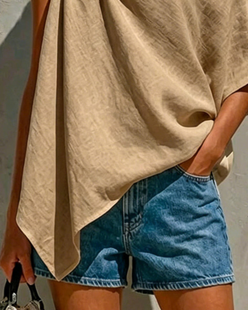 Blusa de un solo hombro con nudo asimétrico