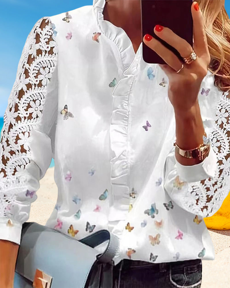 Blusa de encaje con paneles estampados