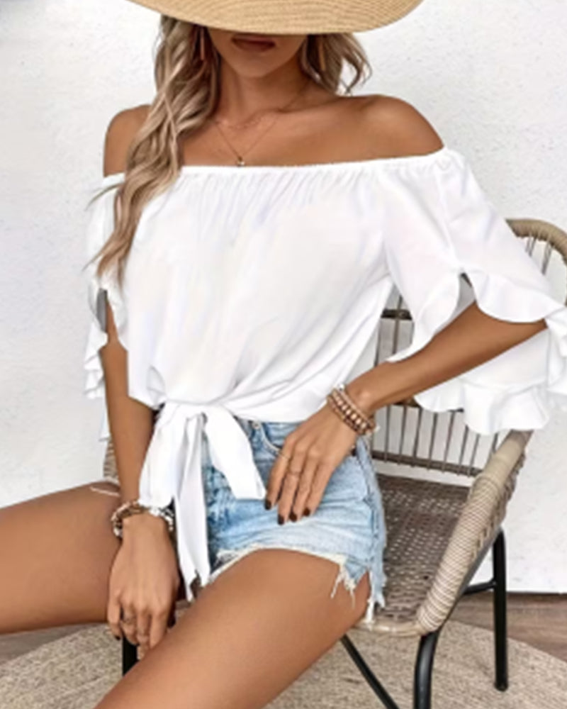 Blusa hombros descubiertos con nudo y mangas acampanadas