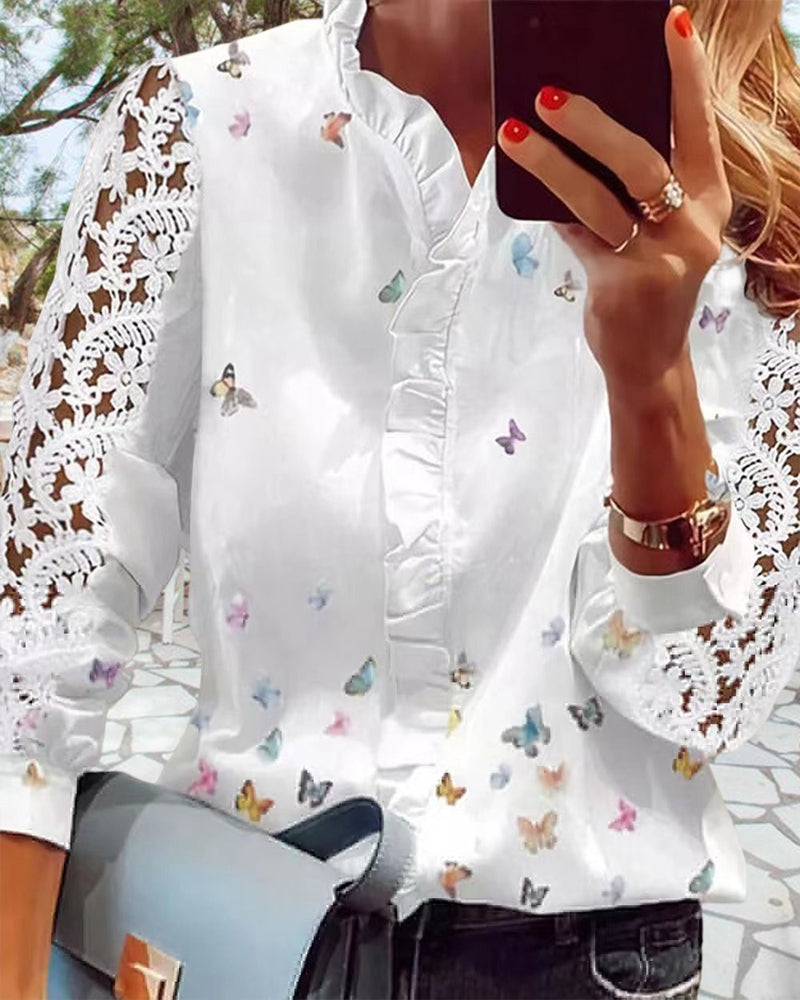 Blusa de encaje con paneles estampados