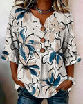 Blusa con escote en V, estampado floral y volante, manga 3/4