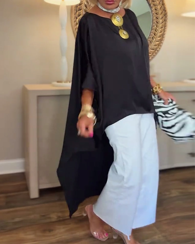 Blusa casual a la moda, irregular y holgada
