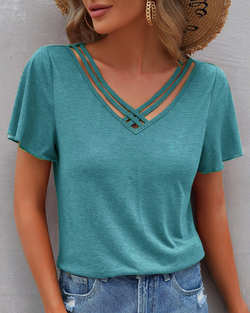Camiseta con recortes de color sólido
