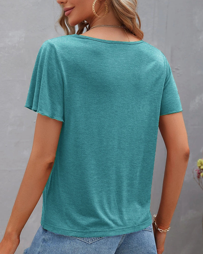 Camiseta con recortes de color sólido