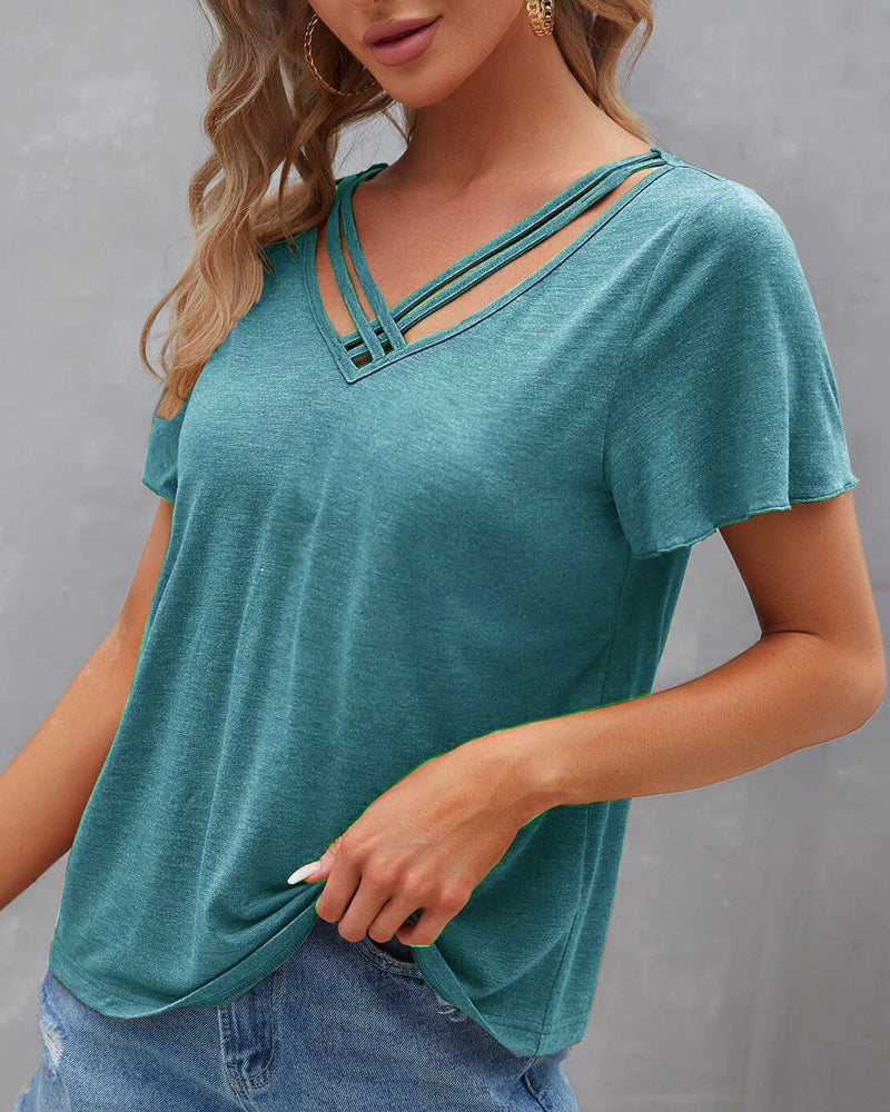 Camiseta con recortes de color sólido