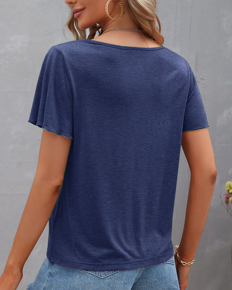 Camiseta con recortes de color sólido
