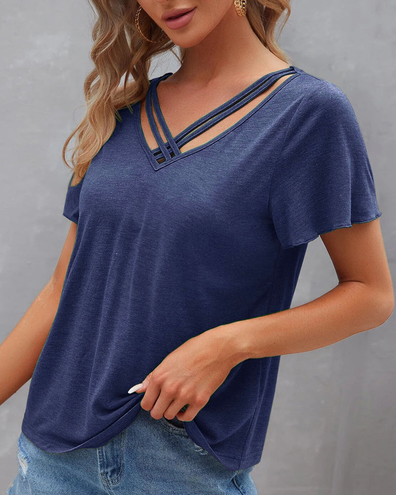 Camiseta con recortes de color sólido