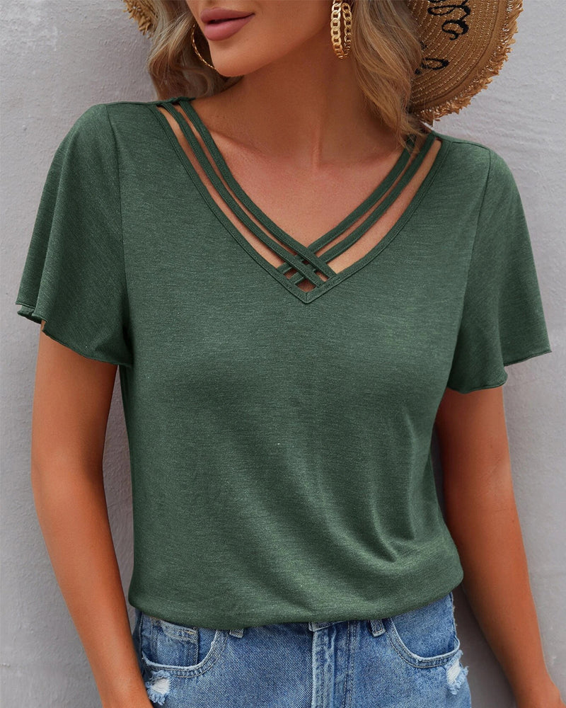 Camiseta con recortes de color sólido
