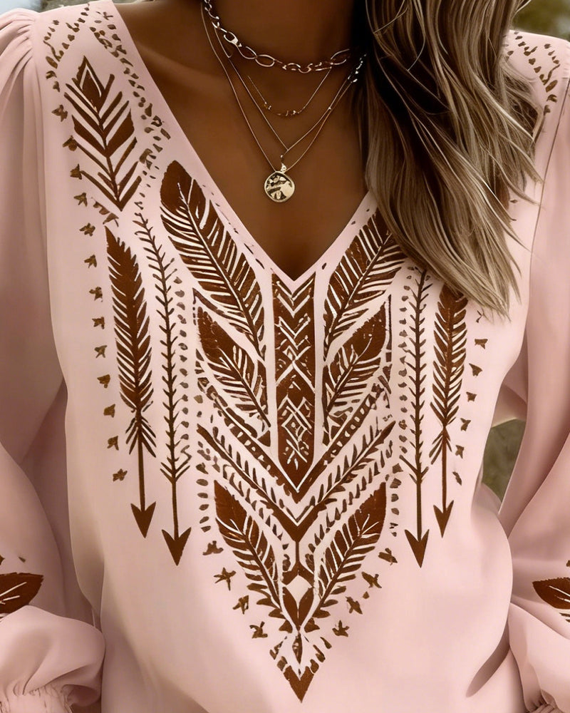 Blusa de manga abullonada con escote en V y corte amplio