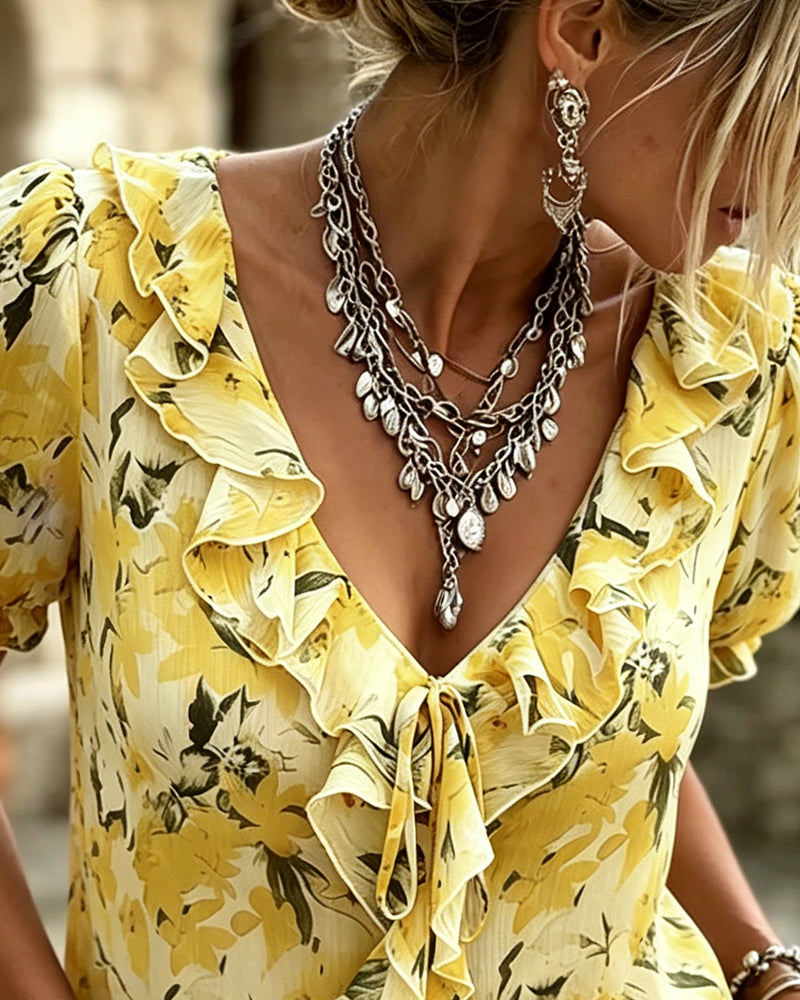 Blusa de escote en V con volante y manga abullonada