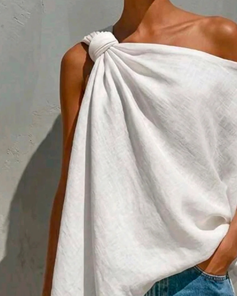 Blusa de un solo hombro con nudo asimétrico