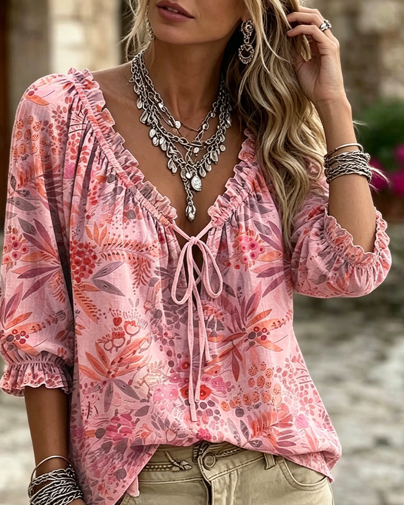 Blusa con escote en V y lazos