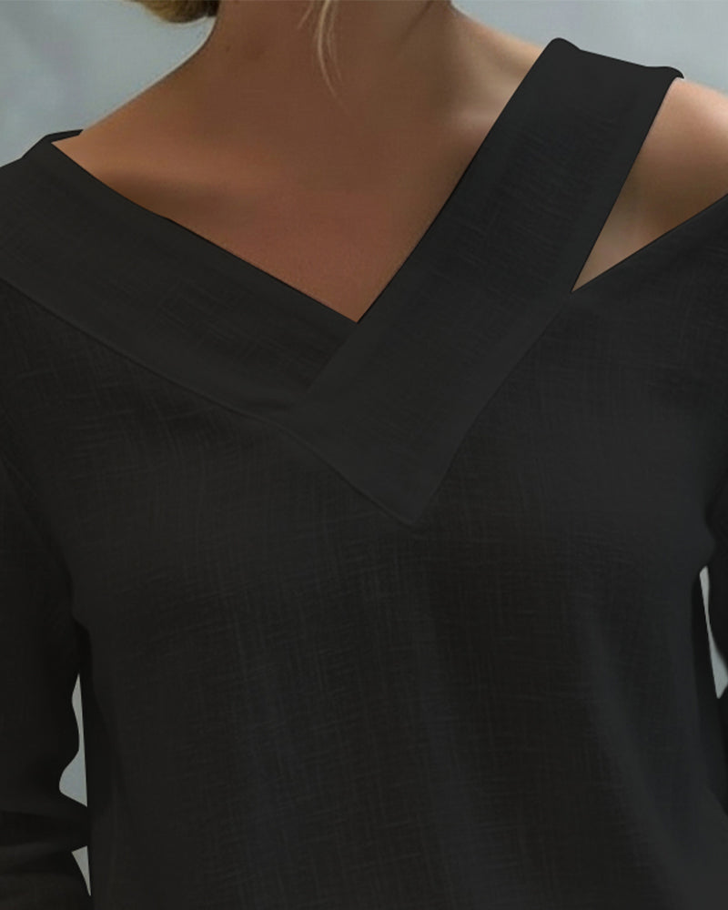 Top elegante con escote en V y tirante caído