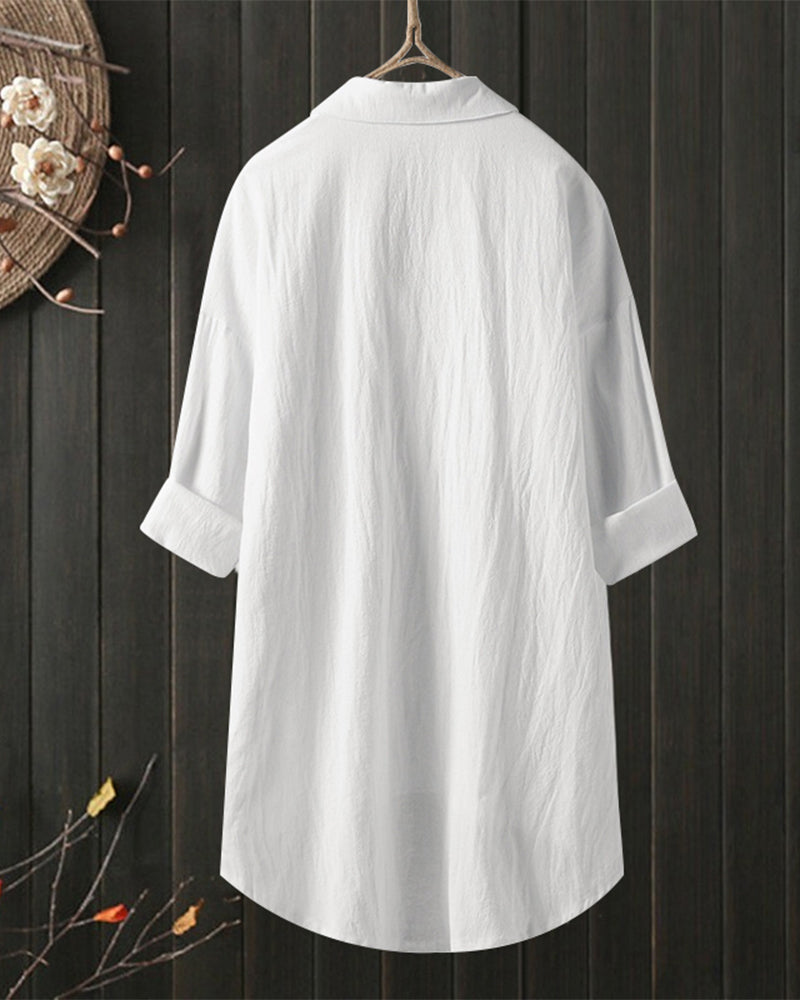 Blusa amplia de color sólido con mangas largas