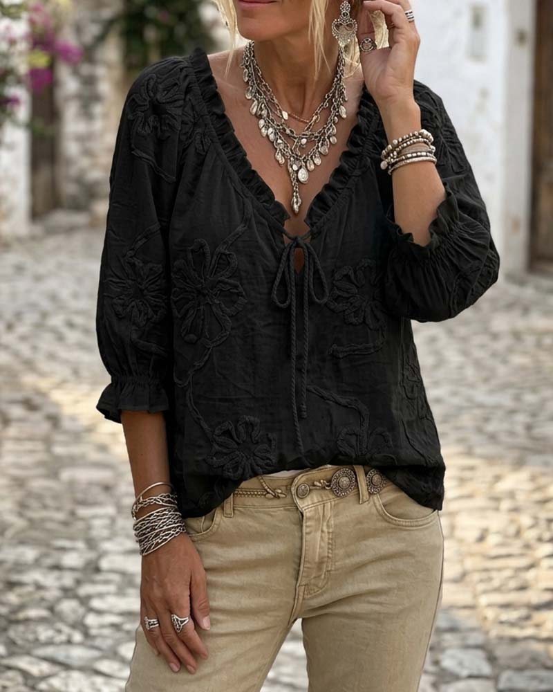 Blusa de algodón 100%, escote en V envolvente, con lazo y volantes