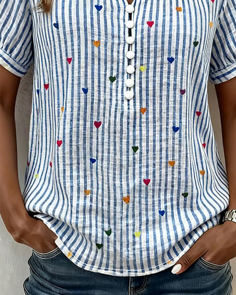 Blusa de mangas abullonadas a rayas con corazón