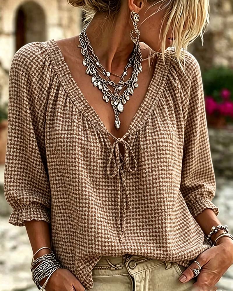 Blusa con cuello en V, mangas globo, con lazo, estampado pata de gallo
