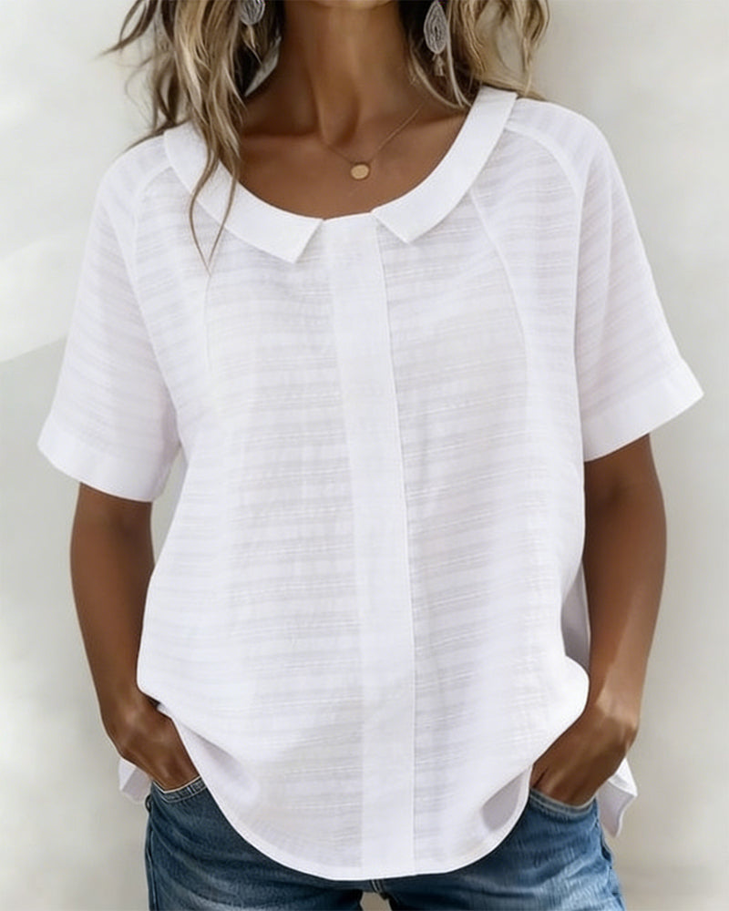 Blusa texturizada con cuello Peter Pan