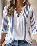 Blusa de rayas verticales con cuello alto