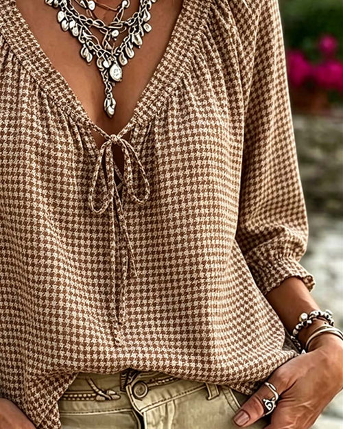 Blusa con cuello en V, mangas globo, con lazo, estampado pata de gallo