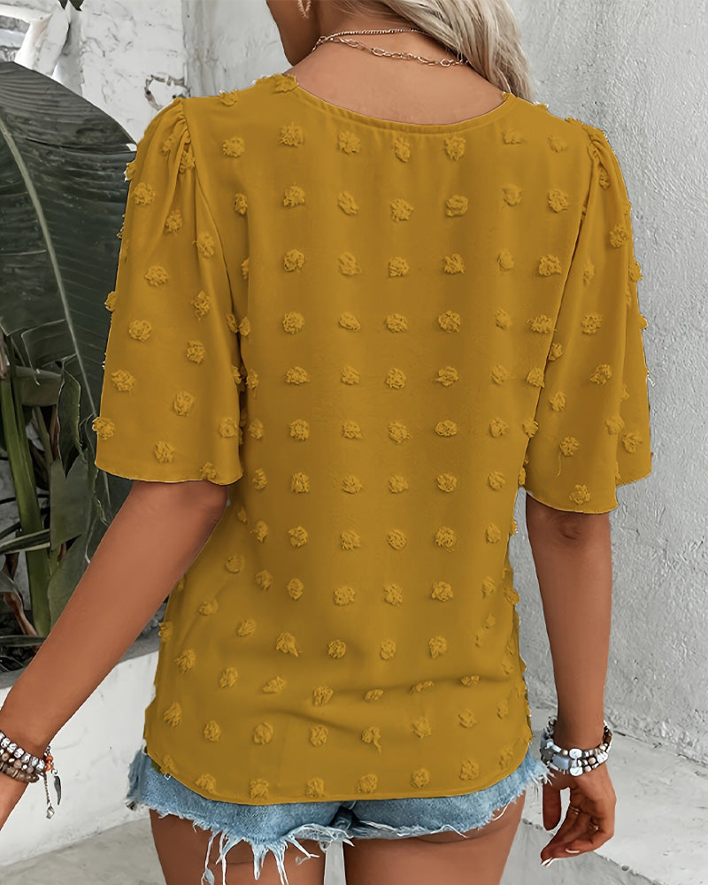 Blusa jacquard con manga volante