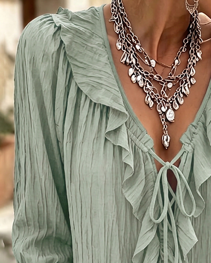 Blusa de manga larga con volante y ribete de encaje