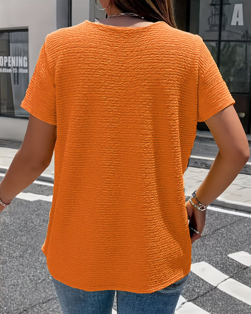 Camiseta con cuello Peter Pan y tres botones