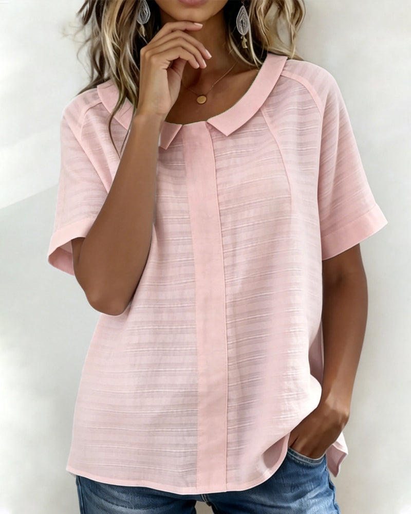 Blusa texturizada con cuello Peter Pan