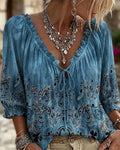 Blusa globo de manga tres cuartos con corbata