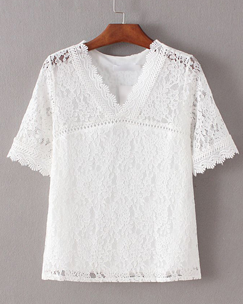 Blusa lisa de mangas cortas en encaje