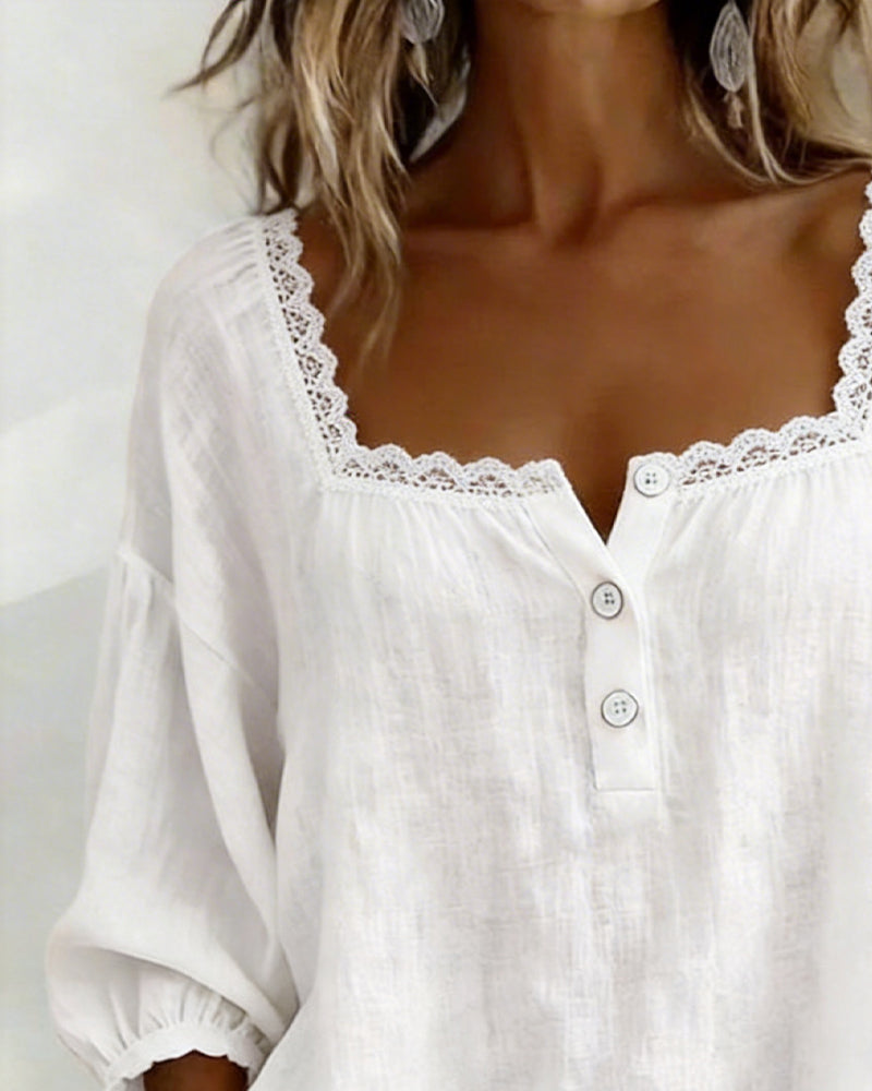 Blusa de cuello cuadrado en encaje con mangas abullonadas