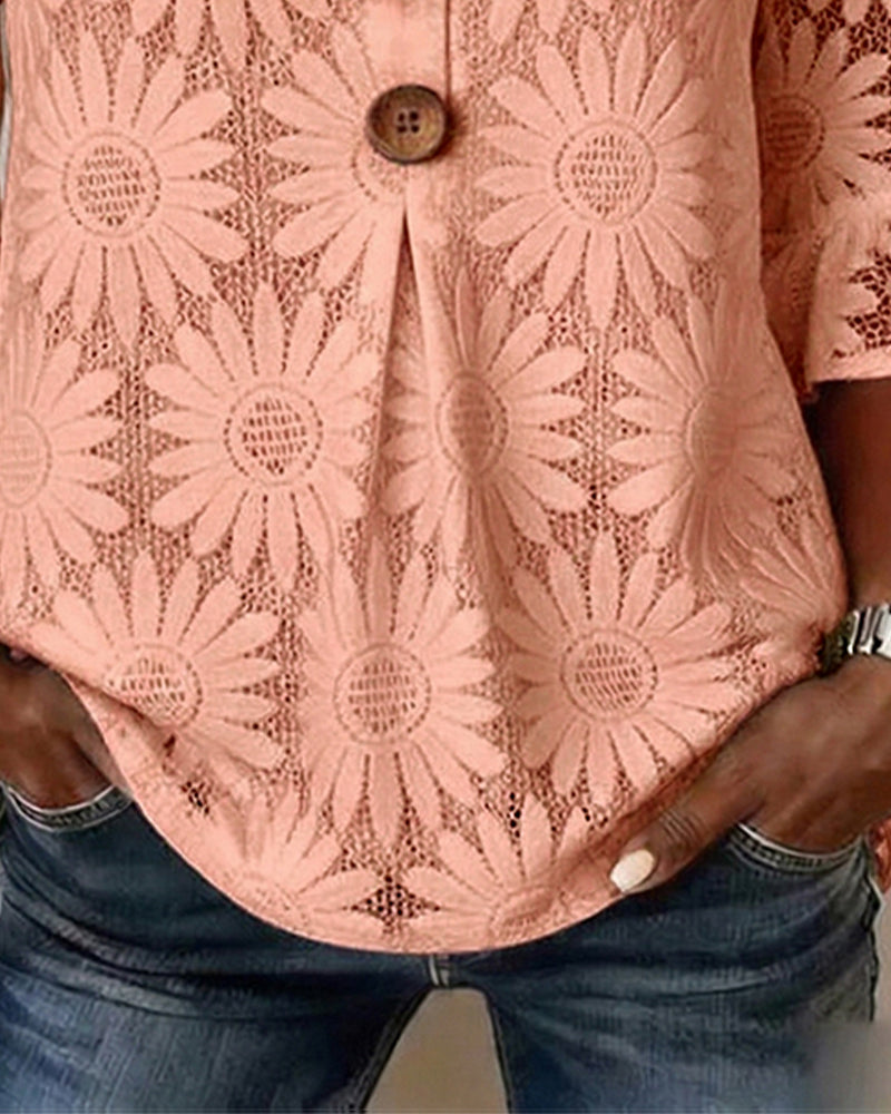 Blusa con estampado de margaritas y mangas con volantes