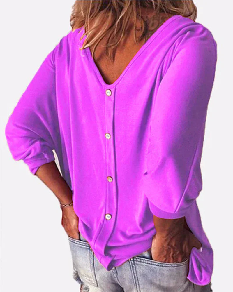 Top de cuello en V con botones en la espalda, mangas 3/4