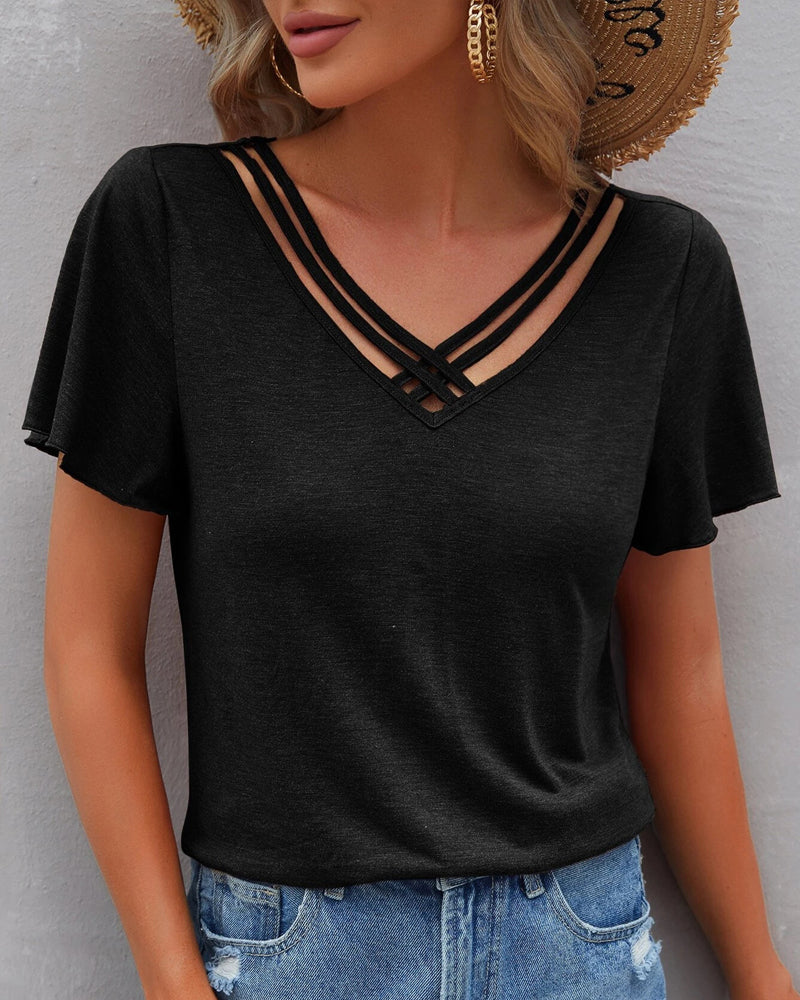 Camiseta con recortes de color sólido