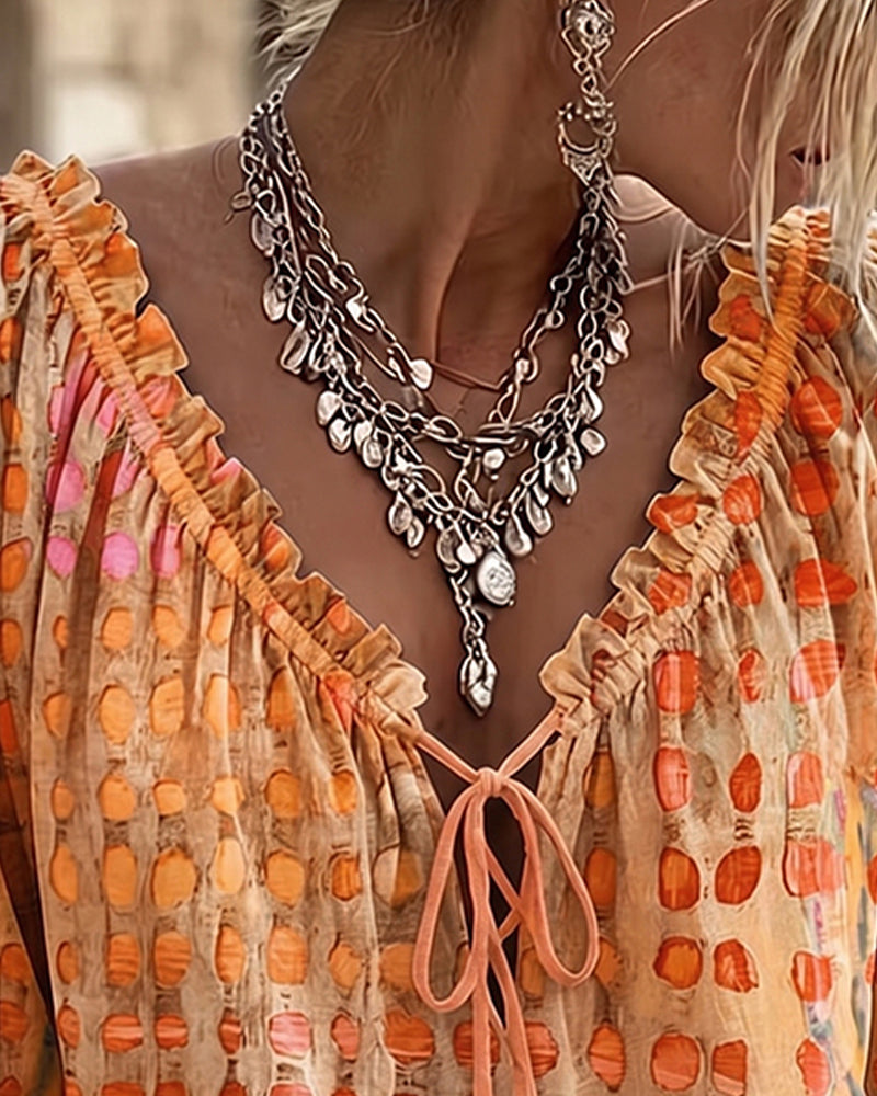 Blusa de lunares con lazos