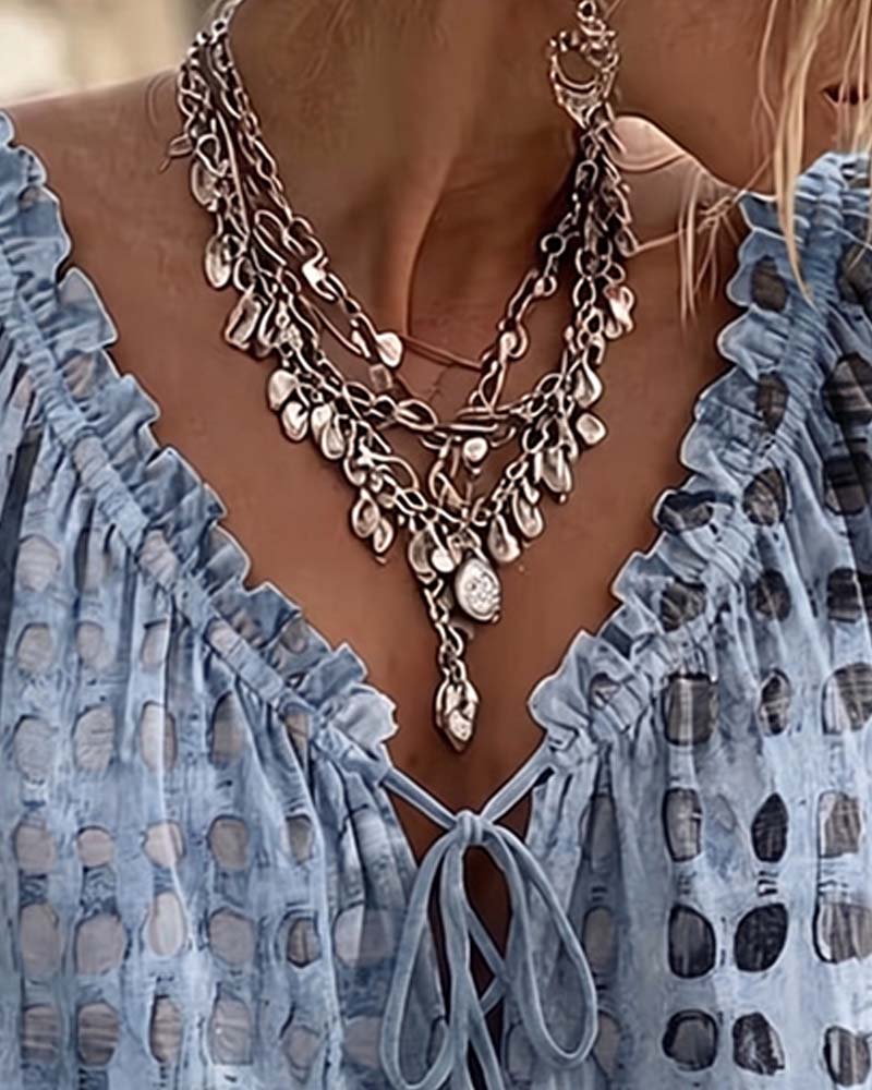 Blusa de lunares con lazos
