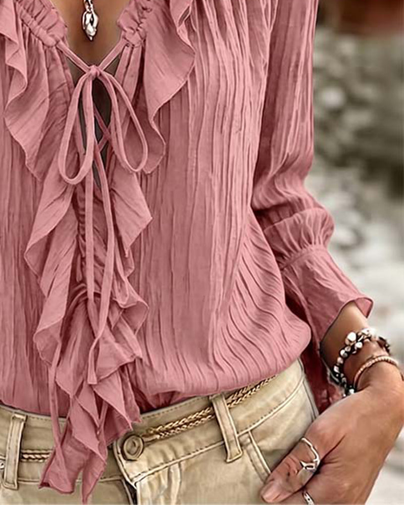 Blusa de manga larga con volante y ribete de encaje