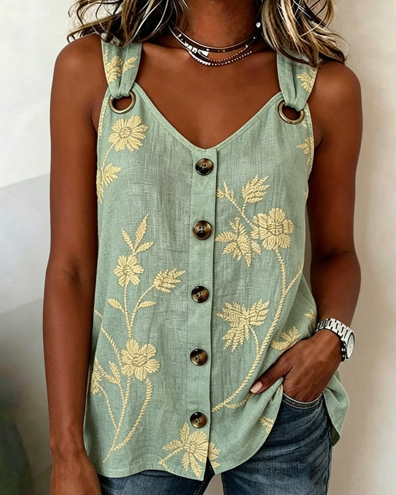 Top sin mangas floral con aro metálico