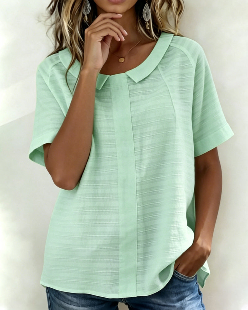 Blusa texturizada con cuello Peter Pan