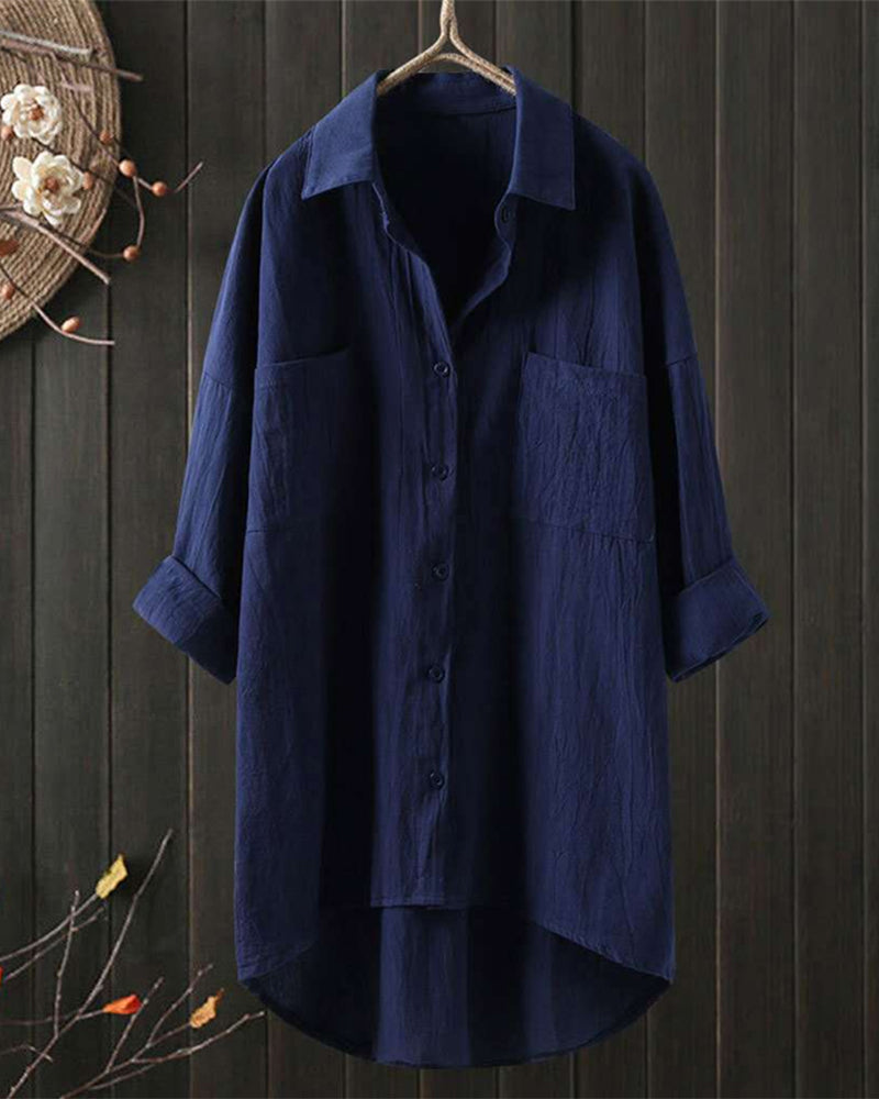 Blusa amplia de color sólido con mangas largas