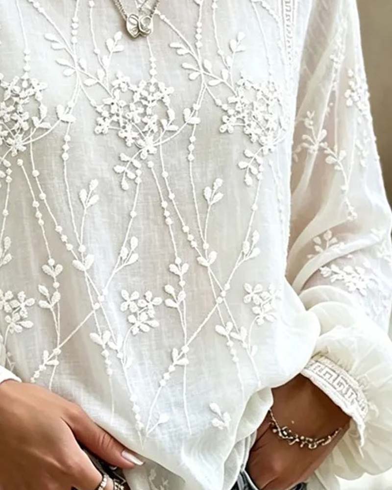 Blusa floral tridimensional de manga farol