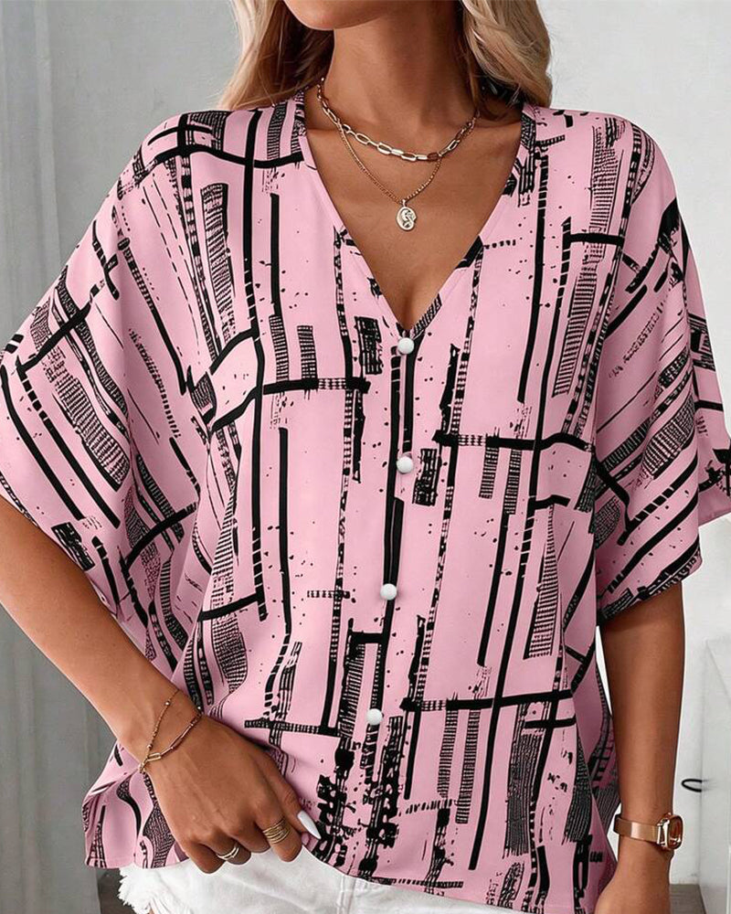Blusa escote en V, corte recto, mangas murciélago