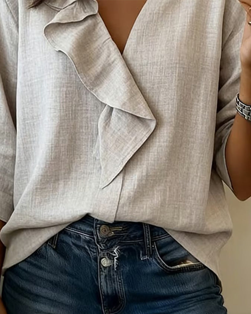 Blusa de volantes de manga larga lisa