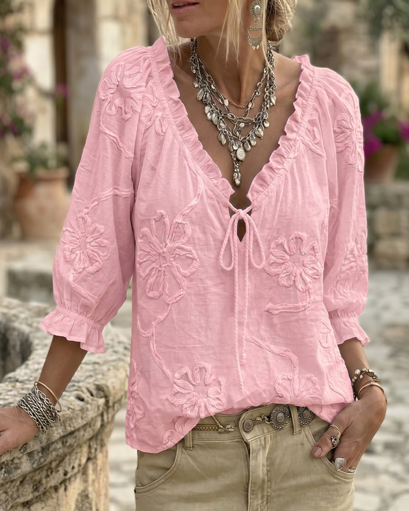 Blusa de algodón 100%, escote en V envolvente, con lazo y volantes