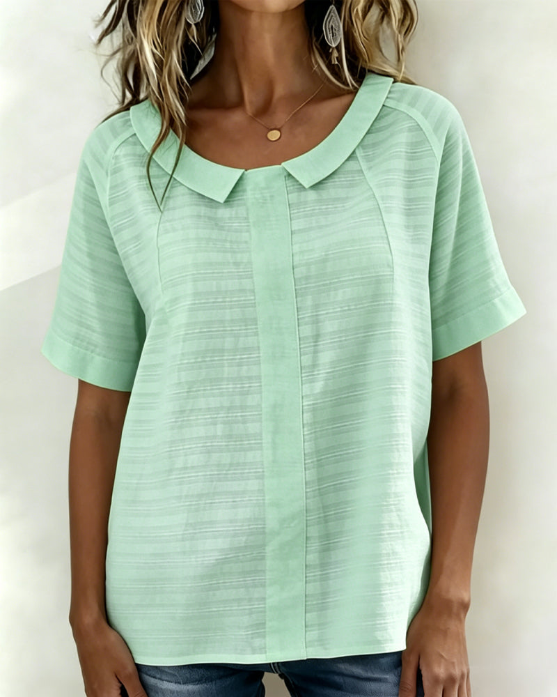 Blusa texturizada con cuello Peter Pan