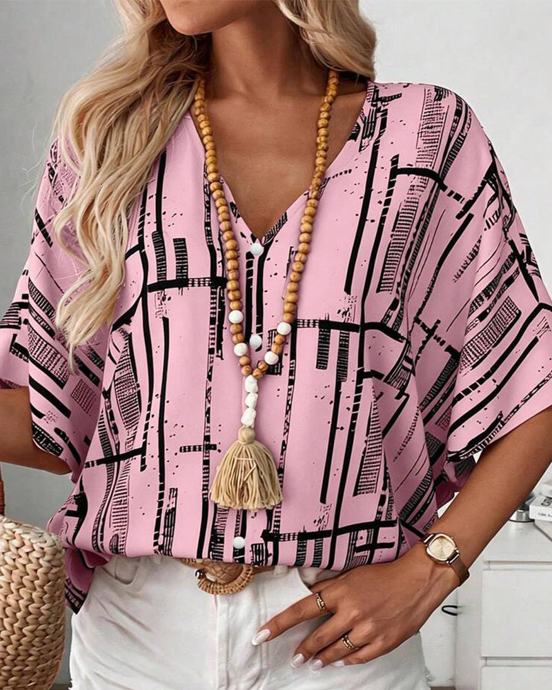 Blusa escote en V, corte recto, mangas murciélago