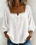 Blusa de cuello cuadrado en encaje con mangas abullonadas